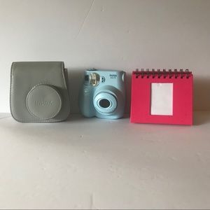 Instax polaroid camera with case and album.